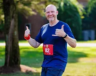 smiling man after completing race
